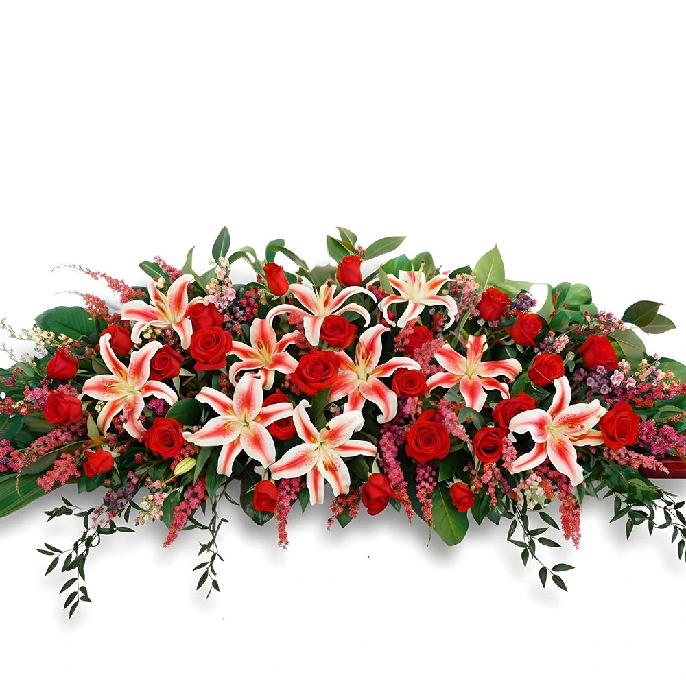Arrangement de roses rouges et lys