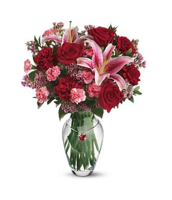 Arrangement floral rose et rouge vif pour les occasions spéciales