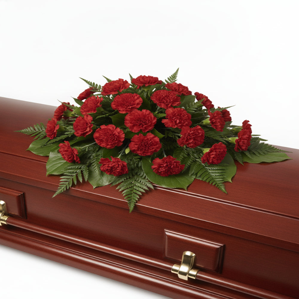 Elegant arrangement of condolence casket spray