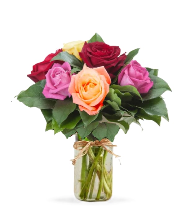Bouquet de roses assorties dans un pot Mason - une demi-douzaine d’arrangements floraux