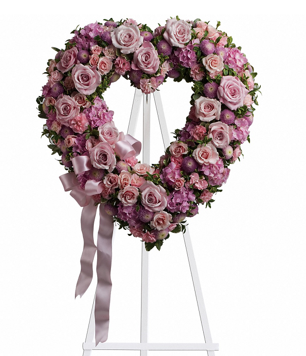 Roseraie en forme de coeur : composition florale romantique