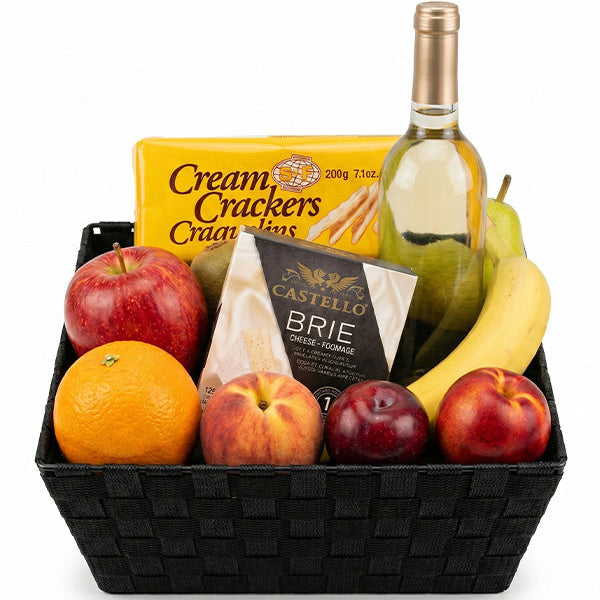 Panier de fruits, vin blanc et fromage