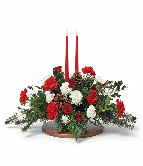 Happy Holidays centerpiece with candles and flowers